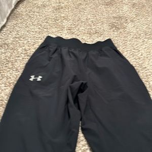 Under armour men’s small athletic pants. Never worn.zipper bottom